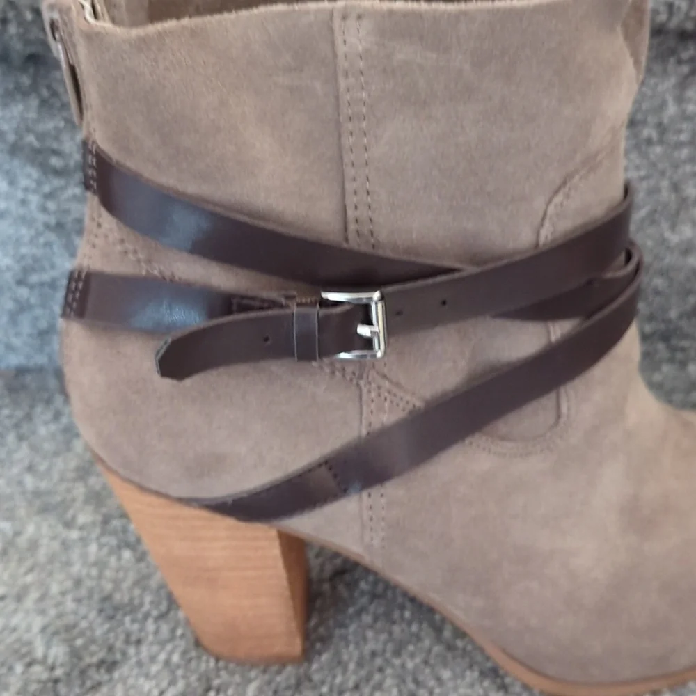 Ankle booties by Carlos Santana